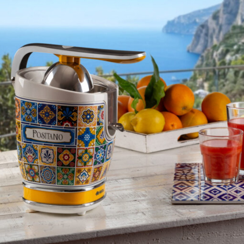 Presă pentru citrice Ariete Positano JUICER 0413/0P, 85W, Corp metalic, Funcționare silențioasă, 2 atașamente, Alb/galben