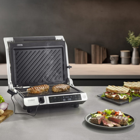Grătar electric 3 în 1 Caso Germany SteakMaster Pro, 2000 W, 34 x 24 cm, 80-240 °C, acoperire ceramică, cronometru, comandă tactilă, inox/negru