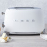 Prăjitor de pâine SMEG 50's Style TSF01WHMEU, 950 W, 2 felii, 6 niveluri, Tava pentru firimituri, Cablu integrat, Oțel inoxidabil, Alb mat