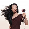 Uscător de păr Dyson HD19 Travel™ 492457-01, 1220 W, 11,6 l/s, 2 viteze, 3 niveluri de temperatură, Air Multiplier, control inteligent al căldurii, ceramic roz/roz auriu